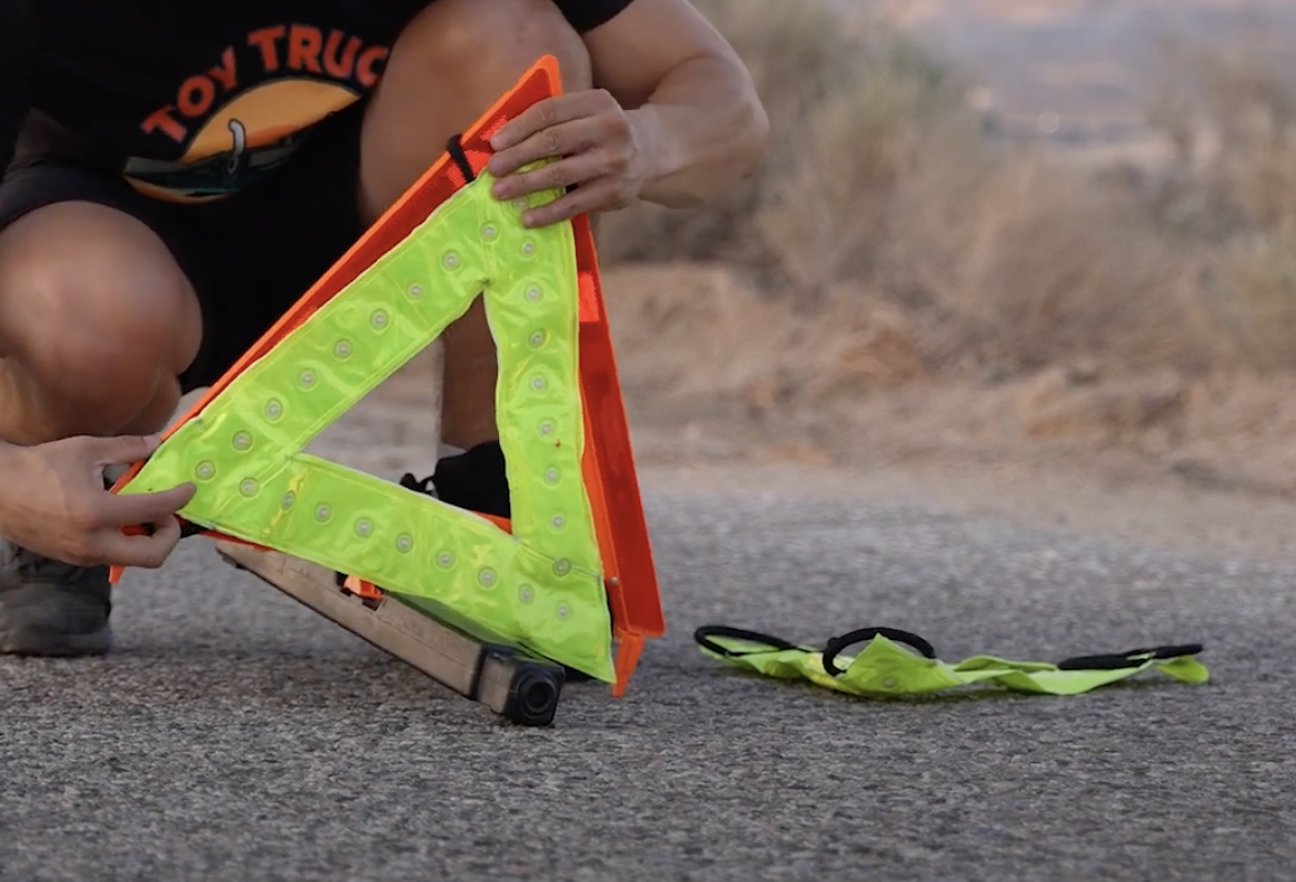 Fitting the TRILIGHT LED triangle over a traditional roadside safety triangle